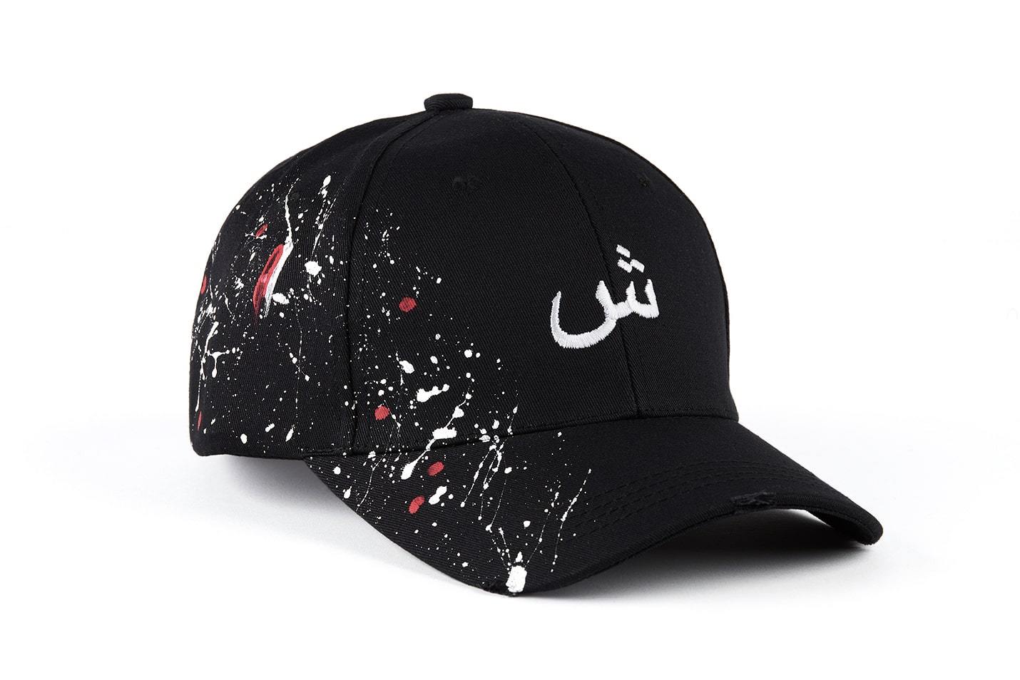 Casquette Kalam Clothing noire Chin avec projection de peinture rouge et blanche