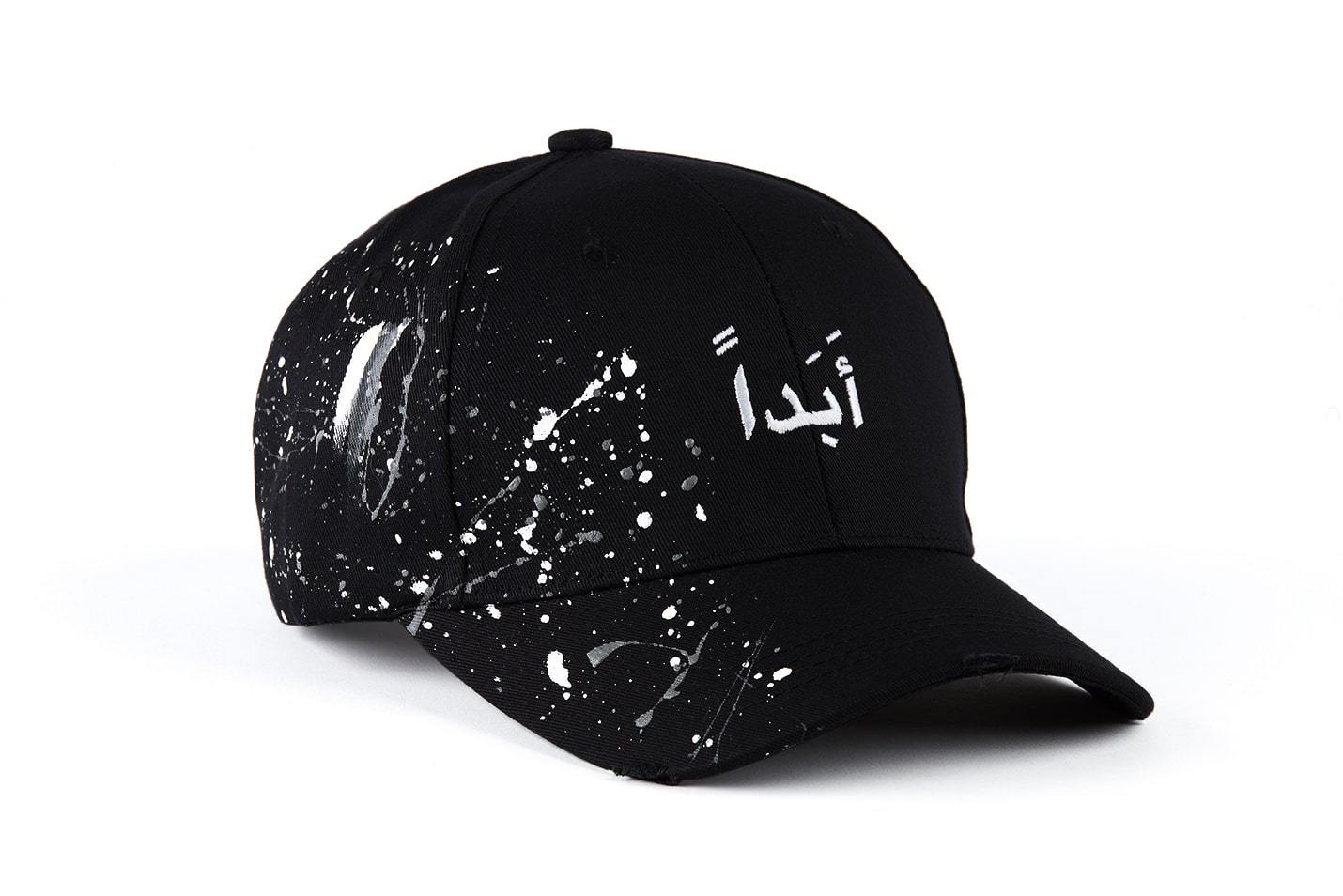 Casquette Kalam Clothing avec inscription arabe Abadane et peinture grise et blanche