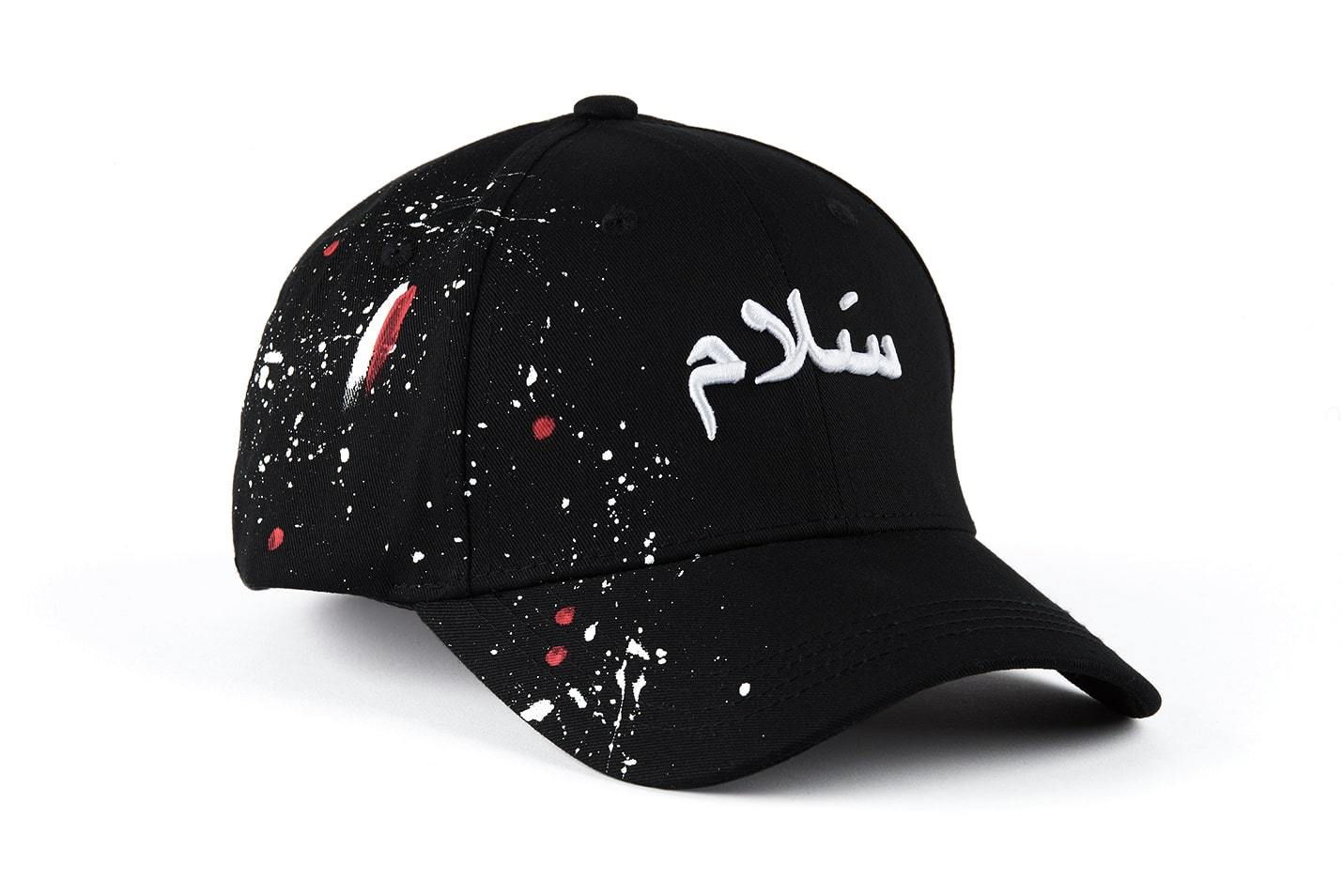 Casquette Kalam Clothing noire avec inscription en arabe Salam et peinture rouge et blanche